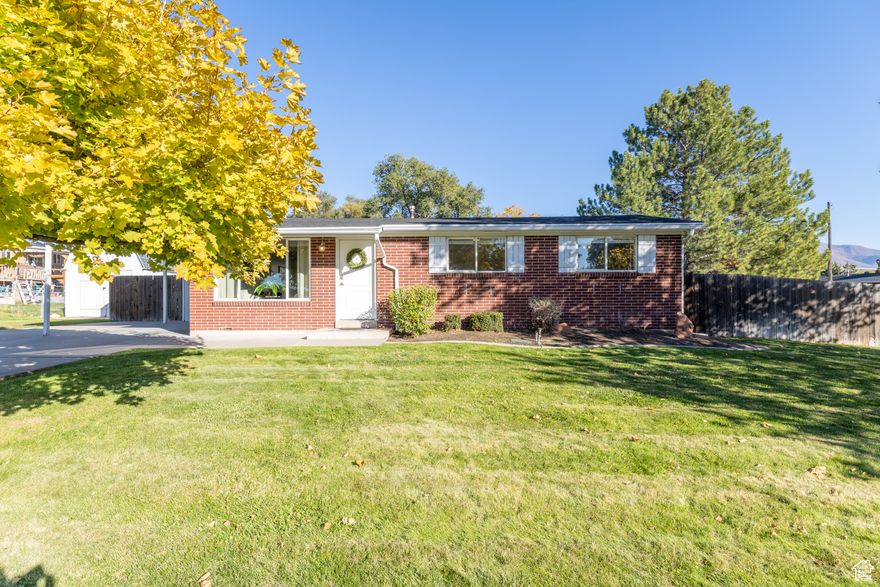 Buyer's loan fell through, back on the market! Charming Brick Home in a Convenient Location! Welcome home to this well-cared-for brick rambler featuring 3 bedrooms and 1 beautifully updated bathroom. You'll love the modern kitchen with stylish finishes and the cozy living room fireplace that creates a warm, inviting atmosphere. The new HVAC system (installed 2025) ensures year-round comfort and efficiency. Step outside into the beautifully landscaped yard-complete with mature trees, garden boxes ready for fresh vegetables, and a large storage shed for all your tools and hobbies. The yard is fully fenced, making it ideal for pets or peaceful outdoor living.  There's plenty of room for parking with a carport and space for four vehicles. Located close to schools, Hill Air Force Base, I-15, restaurants, shopping, and movie theaters, this home offers both comfort and convenience. Perfect for a first-time buyer or anyone seeking easy single-level living.   Call today to schedule your private showing-this one won't last long!