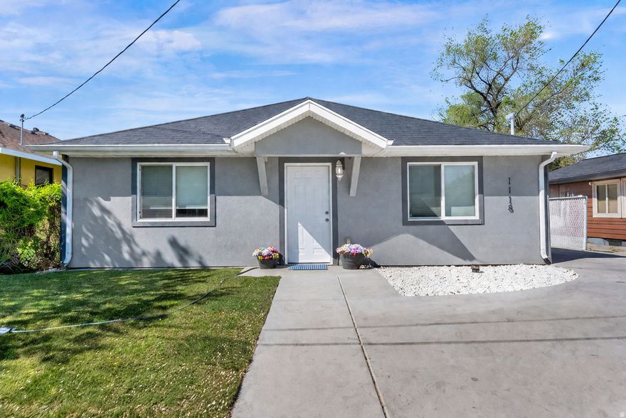 Built in 2017, this single-level home has been exceptionally well cared for and shows like new. The bright, open layout and clean, modern finishes create a comfortable and inviting space for everyday living.  The kitchen flows seamlessly into the main living area, making it easy to gather and entertain. Outside, you'll find a fully fenced yard with a fire pit area and plenty of room to relax or spend time with friends and family. The large driveway and storage shed add extra convenience.  Situated on a quiet dead-end street, and located just down the road from a park and near the Jordan River, this home offers easy access to trails, freeway access, restaurants, and other great amenities.