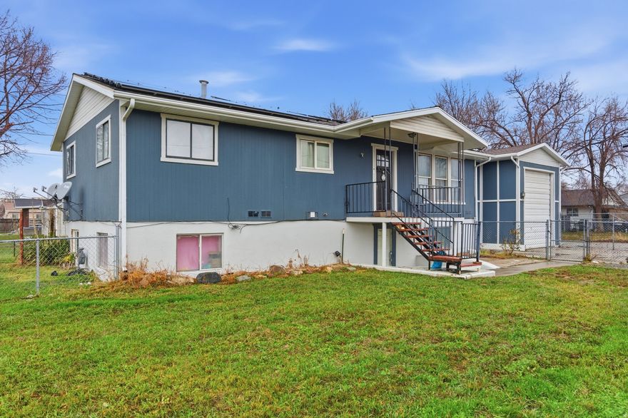 Corner-lot property featuring a mechanic's dream garage with extra height, length & width. Includes a private mother-in-law apartment and $80K in owned solar panels. Exceptional functionality and value-must see! Exceptional opportunity on a prime corner lot featuring a truly rare mechanic's dream garage with extra height, extra length, and extra width, ideal for oversized vehicles, workshop use, or serious hobbyists. The property also includes a separate mother-in-law apartment, offering excellent flexibility for multi-generational living, guests, or potential rental income. Enjoy the long-term benefits of approximately $80,000 in solar panels, significantly reducing energy costs and enhancing efficiency. A unique combination of space, functionality, and value-this is a must-see property with features seldom found in today's market.