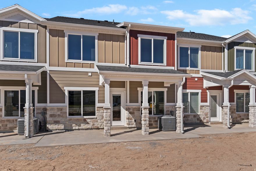 Seller lender incentives to help buy down the interest rate possibly as low as 4.99% on approved APR.! Brand-new townhomes movie in ready, in East Layton offering some of the best value in the area. These units are built by one of Davis County's premier builders, they feature upscale finishes and modern design throughout. Highlights include custom cabinets, LVP flooring across the main level, a walk-in pantry, and an oversized primary bedroom with a large walk-in closet. For a limited time, buyers will also receive a refrigerator, washer, and dryer. Don't miss your chance to own a beautiful new home in a highly desirable East Layton location.  See our website: Wheatridge-townhomes.com