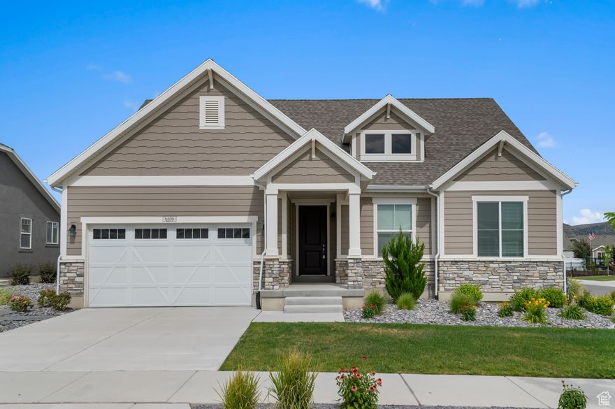 Come see this beautiful Big Cottonwood rambler in a great master planned Overland community. Features include a large kitchen with stylish gray laminate cabinets, quartz counters, tile backsplash and stainless steel gas appliances. Box bay windows provide extra space and light a gas log fireplace in the great room creates a cozy ambiance. Includes an upstairs loft for extra room to relax and entertain. The grand bathroom includes cultured marble shower surrounds and brushed nickel hardware for an elegant feel. Durable flooring consists of carpet, laminate hardwood and tile. Other highlights include 2 tone paint, energy efficient options and expanded patio. Check it out today!