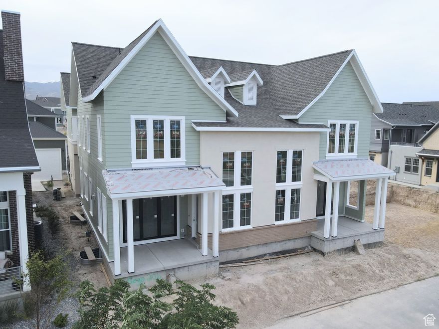 Stunning Waterfront Home with Rentable ADU (apartment above the garage) and Spacious 3-Car Garage. Discover the perfect blend of versatility, comfort, and waterfront living with the brand-new Birmingham floorplan. This thoughtfully designed home offers an expansive layout, ideal for modern living and entertaining. The main living area is crafted for seamless indoor/outdoor living, featuring sliding doors that open to a spacious porch for for enjoying the views along the waterfront. For those who love to cook, the home includes a large walk-in pantry, offering plenty of storage. The Primary bedroom features an upper deck with a pergola, providing a serene retreat. The standout feature of the Birmingham plan is the attached Accessory Dwelling Unit (ADU), offering endless possibilities-whether it's for rental income, a dedicated guest suite, or an extended living space. Current list price is a FINISHED ADU, along with the premium waterfront lot and designer upgrades and options! *$10,000 Preferred Lender Incentive towards rate buy down/closing cost!