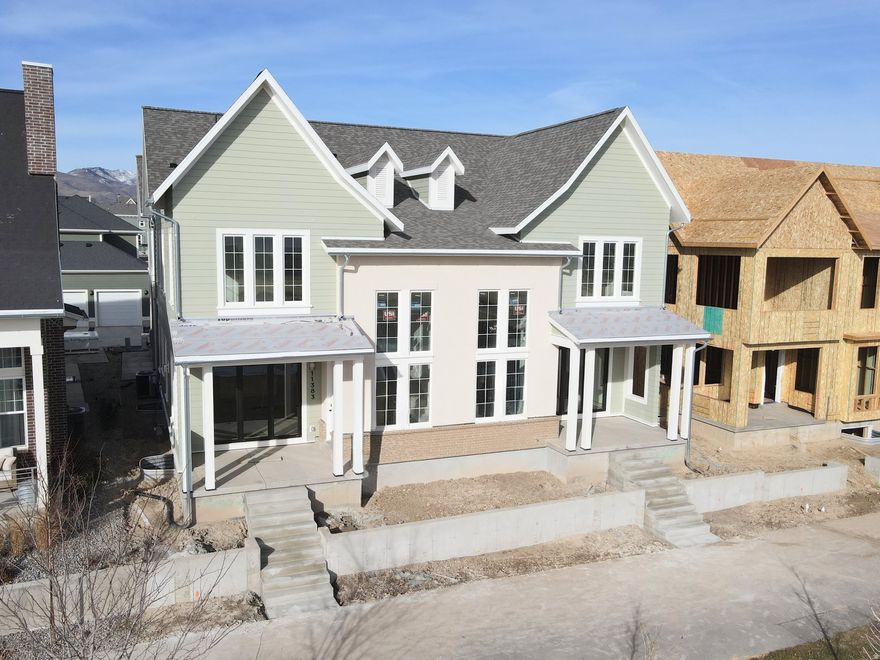 Stunning Waterfront Home with Rentable ADU (apartment above the garage) and Spacious 3-Car Garage. Discover the perfect blend of versatility, comfort, and waterfront living with the brand-new Birmingham floorplan. This thoughtfully designed home offers an expansive layout, ideal for modern living and entertaining. The main living area is crafted for seamless indoor/outdoor living, featuring sliding doors that open to a spacious porch for for enjoying the views along the waterfront. For those who love to cook, the home includes a large walk-in pantry, offering plenty of storage. The Primary bedroom features an upper deck with a pergola, providing a serene retreat. The standout feature of the Birmingham plan is the attached Accessory Dwelling Unit (ADU), offering endless possibilities-whether it's for rental income, a dedicated guest suite, or an extended living space. Current list price is a FINISHED ADU, along with the premium waterfront lot and designer upgrades and options! *$10,000 Preferred Lender Incentive towards rate buy down/closing cost!