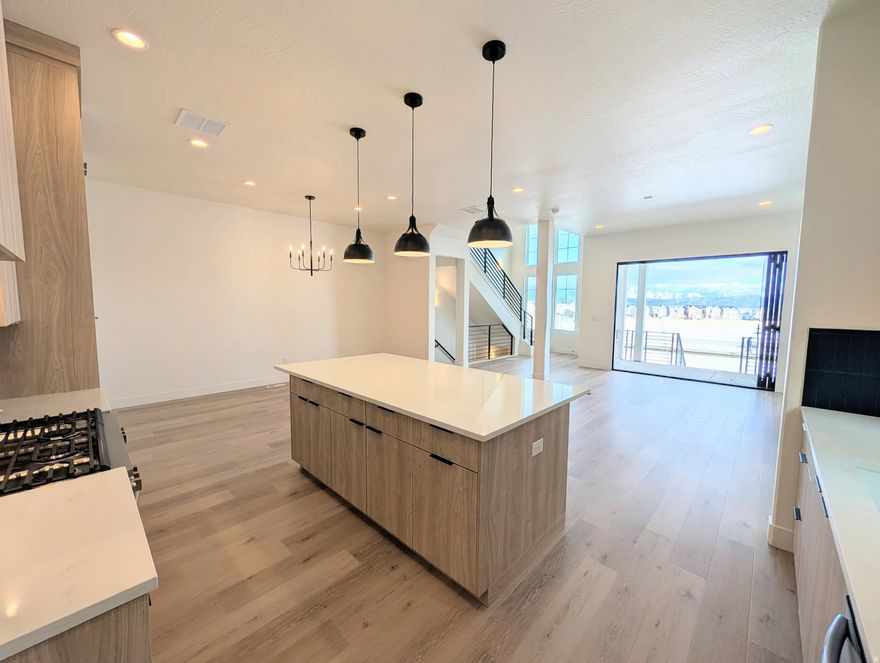 Stunning Waterfront Home with Rentable ADU (apartment above the garage) and Spacious 3-Car Garage. Discover the perfect blend of versatility, comfort, and waterfront living with the brand-new Birmingham floorplan. This thoughtfully designed home offers an expansive layout, ideal for modern living and entertaining. The main living area is crafted for seamless indoor/outdoor living, featuring sliding doors that open to a spacious porch for for enjoying the views along the waterfront. For those who love to cook, the home includes a large walk-in pantry, offering plenty of storage. The Primary bedroom features an upper deck with a pergola, providing a serene retreat. The standout feature of the Birmingham plan is the attached Accessory Dwelling Unit (ADU), offering endless possibilities-whether it's for rental income, a dedicated guest suite, or an extended living space. Current list price is a FINISHED ADU, along with the premium waterfront lot and designer upgrades and options! *$10,000 Preferred Lender Incentive towards rate buy down/closing cost!