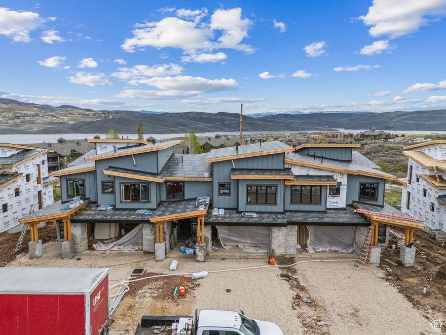 Welcome to Keetley Ridge at Deer Valley East Village! The Powder floorplan/lot 12 is our largest unit of this floorplan. Just 600 meters from the Jordanelle Express Gondola, which provides access to the renowned Deer Valley Resort, Keetley Ridge boasts breathtaking panoramic views of the mountains and ski runs to the west, and the Jordanelle Reservoir to the east. This is your opportunity to own a luxurious townhome just minutes away from the upcoming ski beach at Deer Valley East Village, set to debut in the 2025 ski season. With high-end finishes and ample garage space, this home is perfect for outdoor enthusiasts. Enjoy direct backyard access to the Deer Crest and Jordanelle trail systems, offering over 400 miles of terrain for hiking and mountain biking. Spend your mornings on a sunrise hike or bike ride, and your afternoons boating or paddleboarding on the Jordanelle Reservoir. In the evenings, immerse yourself in the vibrant arts and culture scene of downtown Park City, which is lively year-round. The planned commercial area across the street adds to the luxury and convenience of living at Keetley Ridge. It will feature local restaurants, a neighborhood grocery, and various shops and office spaces, providing essential amenities for both residents and guests. Legal Description: see Tax Id Number