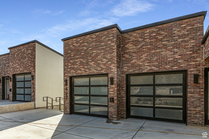 This stunning modern townhome offers unparalleled luxury and convenience, boasting breathtaking valley and lake views.  Nestled on a quiet dead-end-street, it provides a serene retreat while being just 5 min drive to downtown, where you can immerse yourself in vibrant attractions like the Delta Center, City Creek, Eccles theater, and a lively nightlife.  This exquisite home features hardwood floors, quartz countertops, a full suite of high end appliances, and Pella windows to name a few.  The primary suite with it's on ensuite has a walk-out entrance that leads out to a patio. All information is deemed reliable but should be independently verified.