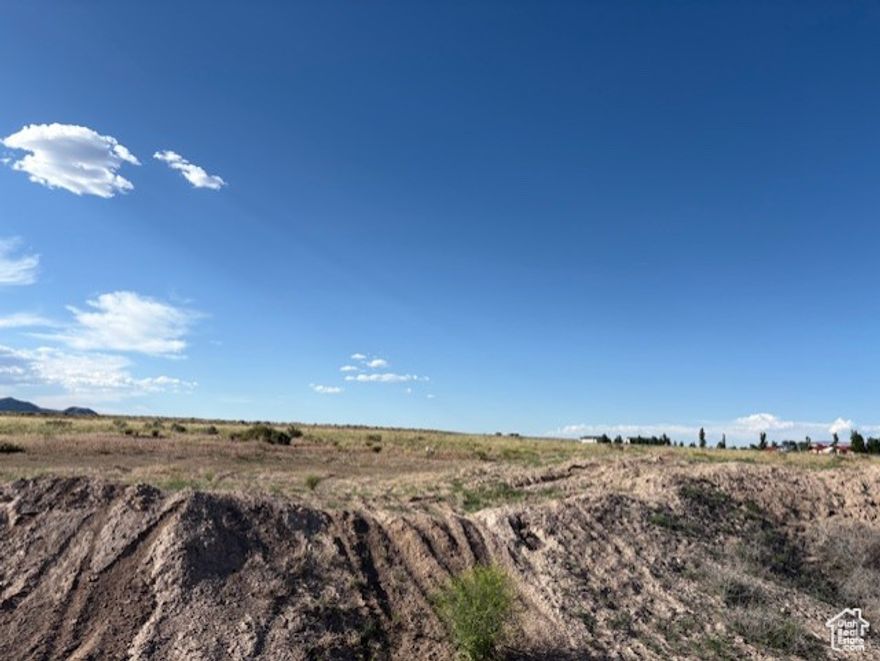 Discover the incredible opportunity this expansive 104.35-acre parcel offers! Nestled in a picturesque location with breathtaking surrounding views, this land is perfect for your next development project. Imagine creating an exceptional community just minutes away from a premier golf course, making it an ideal spot for both residents and leisure seekers. With ample space for subdivision, the possibilities are endless-whether you're envisioning a luxury retreat or a vibrant neighborhood. Plus, the motivated seller is open to joint ventures for development, making this an exceptional opportunity for investors!