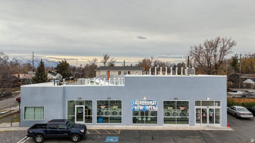 Excellent opportunity to acquire a cash-flowing commercial property with an established operating business. This location is part of a four-property laundromat portfolio in Salt Lake County offered at $6,175,000. Investors may purchase individual locations or inquire about the full portfolio.  Each laundromat in the portfolio has been recently renovated and equipped with modern, high-efficiency machines featuring integrated management software that allows owners to monitor performance, usage, and operations remotely from a smartphone or computer with an internet connection.  All locations are positioned in high-traffic neighborhoods across Salt Lake County, providing strong customer access and consistent demand for self-service laundry.   This specific listing is located in the Rose Park area of Salt Lake City, serving a dense residential population with steady laundry demand.   Portfolio structure:  Four total laundromat locations  Two owner-occupied properties included in the sale  Two leased locations with long term lease terms and extension  Additional portfolio listings:  MLS 5312835  MLS 2137580  MLS 5314876  MLS 5316827  This opportunity may appeal to investors seeking stable cash flow, entrepreneurs entering the laundromat industry, or experienced operators looking to expand an existing portfolio.