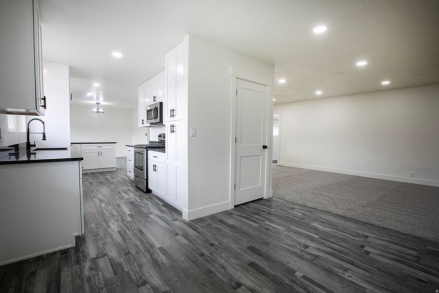 OPEN HOUSE 3-21-2026 1:00 pm-2:00 pm. If you need to be here a little later, text me, and I will wait for you.   STOP SCROLLING - THIS IS THE ONE!  This fully remodeled 3-bed, 3-bath home has everything you've been looking for and more.  Modern updates, fresh finishes, and a move-in-ready feel throughout. Major upgrades include a brand-new roof and a new A/C unit, giving you peace of mind for years to come. This home features a heated indoor swimming pool, perfect for relaxing, entertaining, or enjoying year-round fun with family and friends. There is an over 900 sq ft heated 4-car garage, ideal for ATVs, toys, a workshop, or the ultimate hobby space. Outside, there is a huge backyard that's ready for summer BBQs, family get-togethers, kids playing, or your pets running free. Whether you love to entertain, need room for your toys, or want a home that stands out from the rest, this one delivers. Don't wait    Square footage figures are provided as a courtesy estimate only and were obtained from Tax records.  Buyer is advised to obtain an independent measurement.