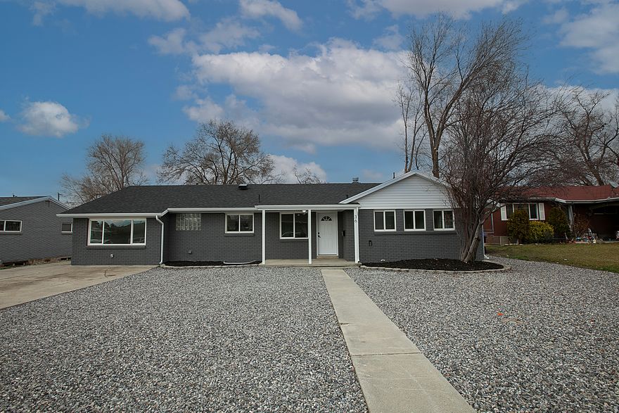 BACK ON THE MARKET HERE IS YOUR OPPORTUNITY  to own this fully remodeled 3-bed, 3-bath home, which has everything you've been looking for and more-modern updates, fresh finishes, move-in-ready. Major upgrades include a brand-new roof and a new A/C unit, giving you peace of mind for years to come. This home features a heated indoor swimming pool, perfect for relaxing, entertaining, or enjoying year-round fun with family and friends. There is an over 900 sq ft heated 4-car garage. Outside, there is a huge backyard that's ready for summer BBQs, family get-togethers, kids playing, or your pets running free, or if you love to entertain.   Square footage figures are provided as a courtesy estimate only and were obtained from Tax records.  Buyer is advised to obtain an independent measurement.