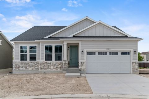 Photo of 590 W JUNEGRASS LN, Stansbury Park, UT 84074 (MLS # 2120976)