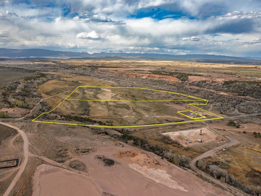 97.46 acres of quality pasture ground in Altamont. This property stays green with natural springs and runoff, making it a solid setup for grazing or horses. Fully fenced and ready to go. Enjoy wide open mountain and valley views with plenty of space to spread out. Easy south access right off Highway 87, with power close by for added convenience. Acreage like this doesn't come up often in the area. Currently zoned for Greenbelt. Buyer to pay roll back taxes if removed from Greenbelt status. No water shares available. Buyer to verify all information.