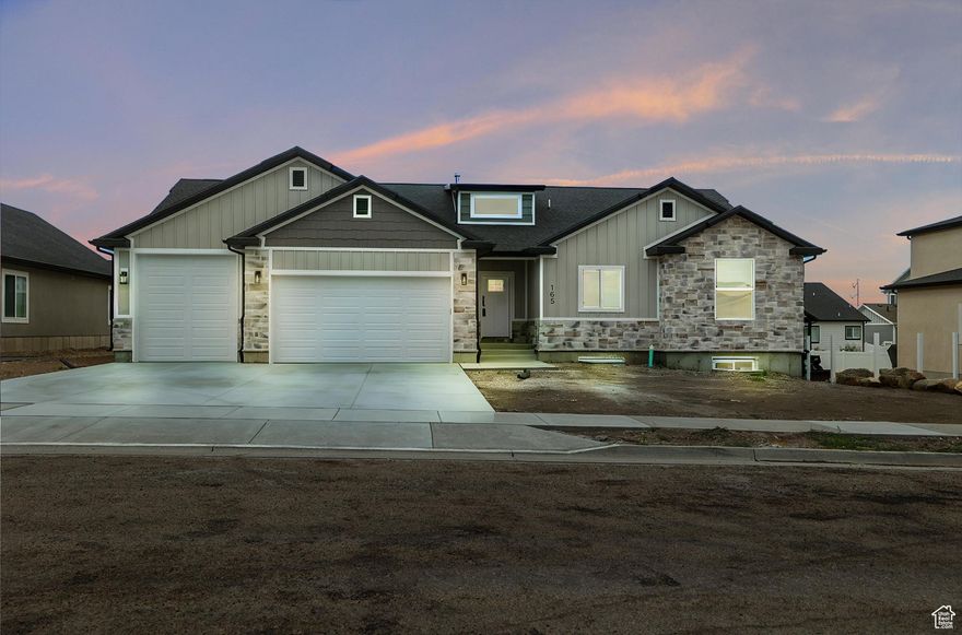 This brand new home boasts vaulted ceilings and a beautiful entryway into the living area.  The kitchen is equipped with custom cabinetry, a gas stovetop, a built-in oven, microwave, and quartz countertops.  The main bedroom and bathroom include a separate tub, shower and walk-in closet. Two additional bedrooms on the main floor offer large closets and share an additional bathroom.  The spacious garage fits four cars with the third car garage featuring extra length, an extra height door and a 240-volt outlet.  The garage walls are fully insulated and painted.  The unfinished basement offers a blank canvas, ideal for creating the space of your dreams.    Square footage figures are provided as a courtesy estimate only and were obtained from building plans.  Buyer is advised to obtain an independent measurement.
