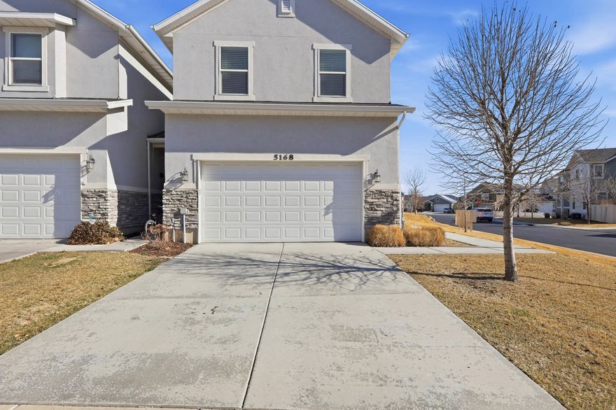 This darling two-story end unit townhome is located right in the heart of Herriman City Center, with shopping, restaurants, parks, and entertainment just minutes away. You'll love the convenience of being close to so many great local spots.