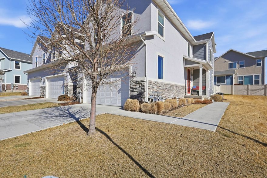 This darling two-story end unit townhome is located right in the heart of Herriman City Center, with shopping, restaurants, parks, and entertainment just minutes away. You'll love the convenience of being close to so many great local spots.