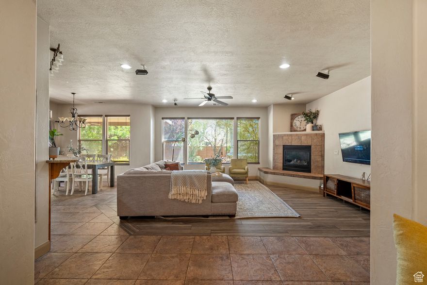 This is an absolute must-see! Quite Area in Ivins. Beautiful mature landscaping with great front and backyard views. wood plank tile flooring, covered patio with draperies, flagstone courtyard and side yard walkway and durable blinds throughout. The front wall mounted fountain is included. Garage workbench and cabinets, surround sound system. Great area to slow down in or invest in.
