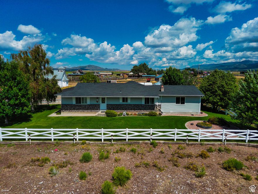 Discover your dream home in this rare, hard-to-find listing nestled in the heart of Manderfield. This stunning property exudes charm and tranquility, making it the perfect escape for those seeking rural country living. Featuring a spacious 5-bedroom, 3-bathroom layout, this large home offers ample space for families of all sizes. The meticulously remodeled kitchen is a chef's delight, boasting modern finishes and a seamless flow into the inviting family room-ideal for gatherings or cozy nights in. Perched on a generous plot, this home comes with animal rights, allowing you to embrace your rural lifestyle fully. Whether you envision raising livestock, keeping horses, or simply enjoying the peace of nature, this property provides the freedom to do so. Prepare to be captivated by incredible views from every angle-perfect for morning coffees or evening sunsets. The expansive surrounding landscape allows for outdoor adventures, starry nights, and a serene backdrop that defines country living. Don't miss the opportunity to own this remarkable property in Manderfield, where quietude meets charm, offering you the idyllic lifestyle you've always desired.