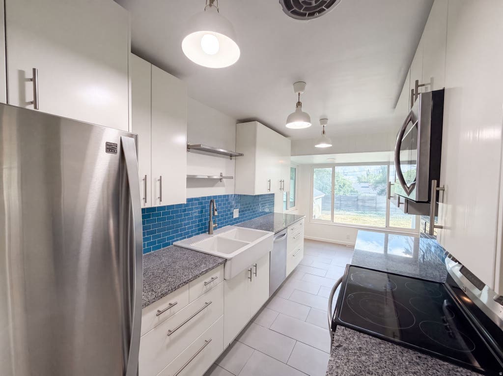 Photo of 1318 29TH ST, Ogden, UT 84403 (MLS # 2178164)