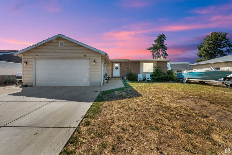 This Woods Cross home has lots of updates, including an updated kitchen that's ready for you to enjoy. The layout offers plenty of living space, and you'll appreciate the convenient RV parking. All this in a desired Woods Cross location. Square footage figures are provided as a courtesy estimate only and were obtained from county records. Buyer is advised to obtain an independent measurement.