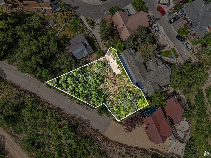 RARE AND HUGE LOT IN OLD TOWN! Nestled in the heart of Historic Old Town Park City off Crescent Tram, this rare and spacious parcel offers an unparalleled opportunity to build your legacy mountain home, up to 6000 sf ,  just steps from world-class skiing and the vibrant charm of Main Street. Located adjacent to the Town Lift ski run, this nearly ski-in, ski-out homesite places you just a short glide or stroll to the slopes-and only a few minutes' walk to Park City's renowned dining, shopping, and entertainment.  Whether you're seeking a luxurious private retreat or an investment with premier access, this one-of-a-kind lot combines the best of both worlds: the energy of Old Town with the serenity of the mountains. Opportunities like this are scarce-live where others dream of vacationing. Buyer responsible to verify all information provided to their satisfaction.