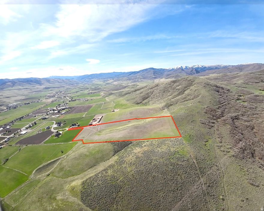 Truly stunning location! Just a few miles from Wasatch Peaks Resort, East Canyon state park and lake. And less than 25 miles from Snow Basin Ski resort and Pineveiw Reservoir! Discover this HORSE PROPERTY for your perfect little oasis in the country!! Make your dreams come true and build your DREAM HOME with a shop/shed and barn! Secluded right at the end of a Cul-de-sac. Discover the perfect blend of privacy, beauty, and opportunity with this incredible 19.71-acre parcel. Nestled in a serene setting, this property offers breathtaking, unobstructed mountain views and the rare advantage of NO BACKYARD NEIGHBORS, ensuring lasting privacy and tranquility. This premium horse property provides TONS OF SPACE FOR YOU AND YOUR FAMILY. With 3 valuable water shares included and utilities already stubbed, much of the groundwork is in place to make building seamless and convenient. Bring you animals here to graze and roam free or farm the land yourself! Water, power, gas utilities available. Septic tank required. Buyer and buyers agent to verify all.