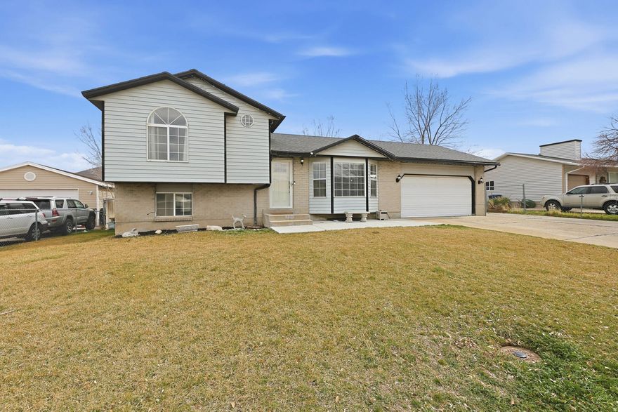 Beautifully Updated  4 bedroom Multilevel Home! This well maintained and thoughtfully upgraded home features 4 bedrooms, 2 bathrooms, and a bright multilevel layout. Many updates include, new roof, granite countertops, modernized bathrooms, and new laminate flooring throughout, giving the home a fresh and cohesive feel. You'll appreciate the spacious 2 car garage plus RV parking, offering plenty of room for vehicles, storage, and all your toys. The large, fully fenced backyard is perfect for gatherings, complete with an extended patio and a covered awning for yearround enjoyment. Conveniently located near schools, parks, and shopping. Square footage figures are provided as a courtesy estimate only and were obtained from county records. Buyer is advised to obtain an independent measurement.