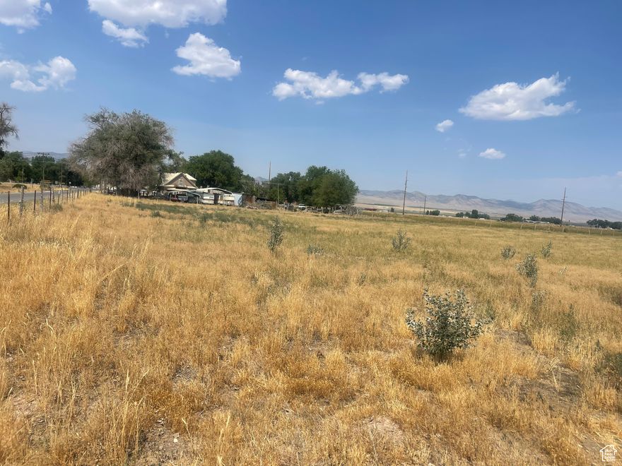 Needing more than an Acre of ground with a very reasonable price tag?? Here it is!  South facing cleared building lot in Axtell with easy access into Gunnison or Salina for shopping. No Need to sacrifice being able to build your dream home on a beautiful serene plot of dirt with more private surroundings which this parcel in deed  will provide! Includes 3 shares of Willow Creek Water Stock. Axtell requires more than 3 shares of water in order to obtain a building permit. Axtell currently has a moratorium against building until the new pond is completed.  This gives a buyer time to purchase this lot and time to get your building "game plan" in order.  Buyer and buyers agent to verify any and all information.