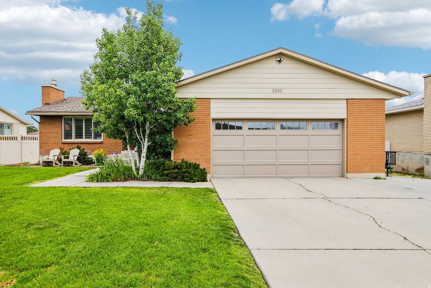 Move-in ready with major updates and incredible parking! This well-maintained home features newer LVP flooring throughout the living room and hallway, a new gas fireplace (2021), new water heater (2022),  updated windows, central air, and a spacious layout with great gathering spaces upstairs and down.  Enjoy a comfortable dining area and an updated primary bathroom with new tile surround. Large family room with surround sound and new carpet-perfect for movie nights, entertaining, or extra living space. Walkout basement offers excellent potential for future ADU-style setup or separate living space.  Outside, you'll love the covered patio, sprinkler system, storage shed, oversized 2-car garage, RV parking, and extended driveway with a basketball court and adjustable breakaway rim.  Additional big-ticket updates include new siding (2026) and newer roof, soffit, fascia, and raingutters (2016).  Conveniently located near schools, shopping, dining, and freeway access. Homes with this combination of updates, parking, and functionality are hard to find-schedule your private showing today!