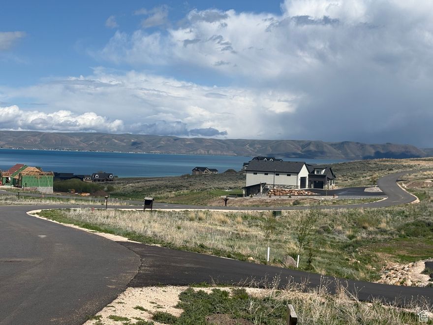 The Reserve at Bear Lake, PH 6 Lot 110 1.03 acres -- almost flat building lot with all utilities stubbed, gated with paved roads maintained year round. Great amenities: Clubhouse with fitness room, two heated pools (seasonal), hot tub (year round), splash pad, covered poolside pavilion, sports court, playground and 1800' of gated beach access. 10 minutes to launch watercraft at Bear Lake State Park marina; 25 minutes to enjoy skiing/snowboarding at Beaver Mountain Ski Resort. ATV/UTV, snowmobiling, snowshoeing, hiking and mountain biking in Fish Haven Canyon can be accessed from The Reserve.
