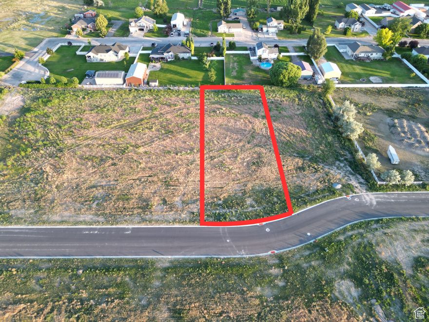 Looking for a large lot to build your home? This is it!! This lot offers you the opportunity to build your dream home and hobby farm in a developed community in West Weber County. If you enjoy wide open spaces, beautiful summer sunsets and the feel of the country this is the location for you. This is a rare opportunity for you to bring your own builder, be your own builder or we can refer you to a builder. Stubbed for culinary, secondary, sewer, gas and power. Ready for a building permit to be pulled. This lot is .80. It's 115' wide and just over 305' deep. The setbacks are 30' in the front, 10' on the sides with 24' for both sides. Buyer agent and buyer to verify all information.