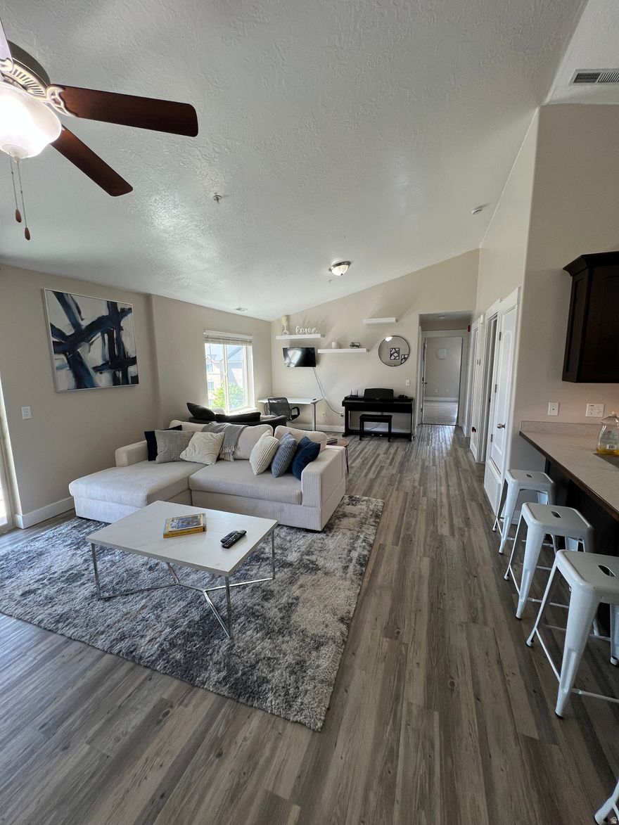 Stunning 2-Bed, 2-Bath Condo in Payson, UT - with Gorgeous Views. This beautifully updated condo offers modern living with breathtaking views in a prime location. Featuring an extra large living room, 2 spacious bedrooms, 2 full baths, and a large walk-in closet in the primary, it's perfect for comfortable living. Enjoy the open, airy layout that flows seamlessly from room to room. Step outside and take in the surrounding mountain views or explore nearby walking trails, perfect for outdoor enthusiasts. The community amenities include a shared gym and a well-maintained common space, providing a relaxing atmosphere. Don't miss the chance to call this gem home! Square footage figures are provided as a courtesy estimate only and were obtained from County Records. Buyer is advised to obtain an independent measurement.