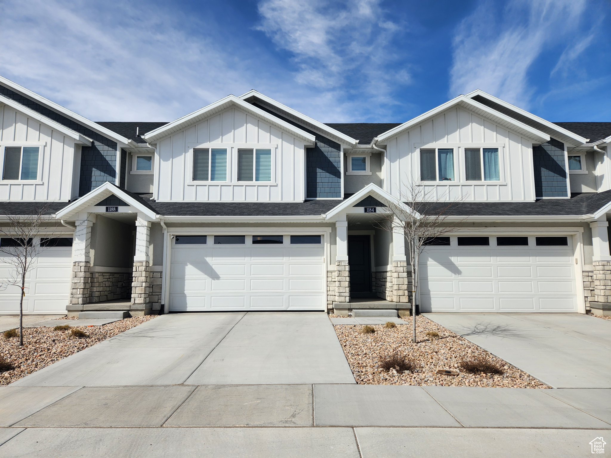 This home is stunning with its quartz countertops, white cabinets that go to the CEILING! spacious rooms, & master suite with an oversized walk-in closet, Open concept Kitchen, Living, Dining.  upgraded w/ LAMINATE flooring throughout, Also have private patio with the fenced in back yard, and fully finished garage with epoxy floor!!! MOVE-IN READY townhome, less than 2 MINUTES off of I-15 and restaurants, shopping.