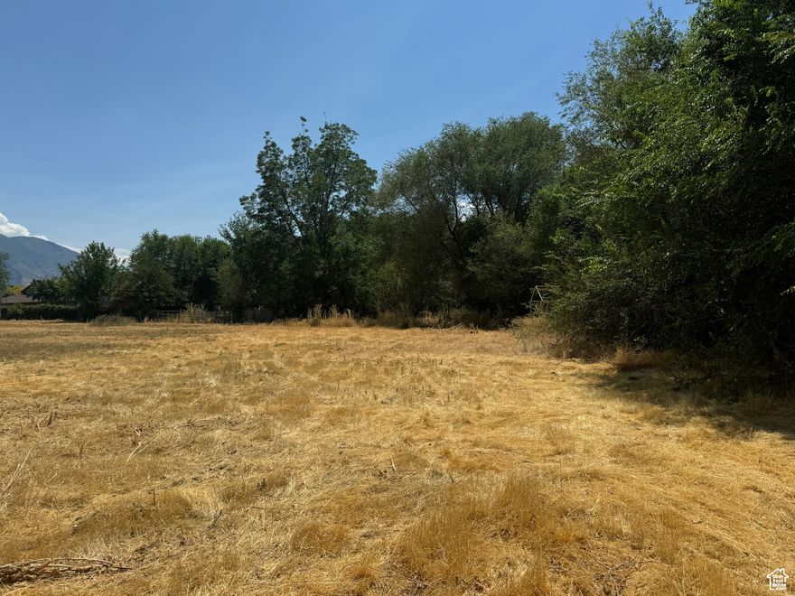 3.25 Acres opportunity in South Orem near Nielsen Park. Near Nielsen Park, Utah Valley University, Brigham Young University, WalMart, I-15, and lots of shopping. Next to LDS Church building. Seller does not have any water shares. Utilities, Water, Sewer, etc are on the property. Currently zoned R1-8. Seller has Phase I, Geotech, and 9 lot subdivision concept plan.  Please call agent with questions.