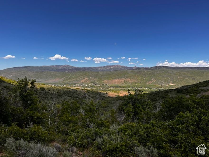 Views views views!  Build your dream mountain home on this incredibly private 20 acre parcel. Just a short distance from Kamas, Park City, and Heber city with outdoor recreation right out your door. Hiking and mountain biking in the summer; snowmobiling skiing and snow shoeing in the winter. Easy to get to in the gated community of Woodland Crest this property offers a rare balance of foliage, privacy, and views.   Well already drilled with a water right included as well as a PERC test and very good topographical survey done, making it all that much easier to build.  Buyer to verify all info. All information herein is deemed reliable but is not guaranteed. Buyer is responsible to verify all listing information, including square feet/acreage, to buyer's own satisfaction.