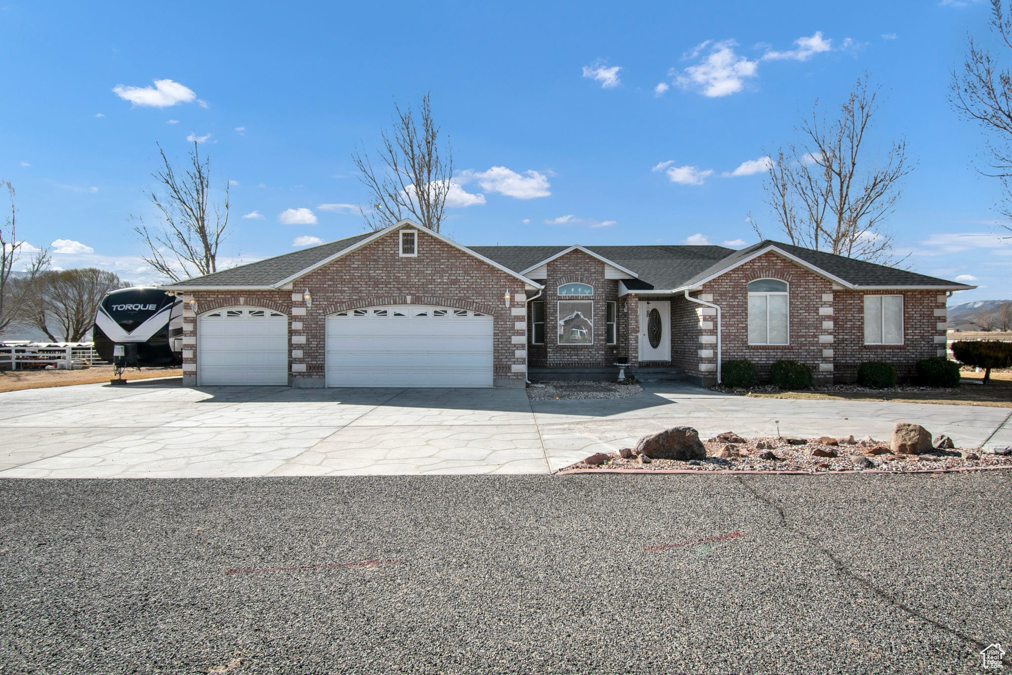 Nestled in a private cul-de-sac in the coveted town of Central Valley, this well-maintained, single-level home sits on 3 acres of breathtaking land with panoramic mountain views. Inside, you'll find 1,905 sq. ft. of thoughtfully designed living space, featuring 3 bedrooms, 2.5 bathrooms, and a spacious open floor plan.The well-appointed kitchen flows seamlessly into the inviting living area. Creating a warm and welcoming atmosphere, making it ideal for gathering with family and friends. Additional features include a three-car garage with extra storage room, irrigation water, and plenty of outdoor space for animals or gardening. Offering the perfect balance of privacy and adventure, this property is just moments from ATV trails, hiking, and biking paths.