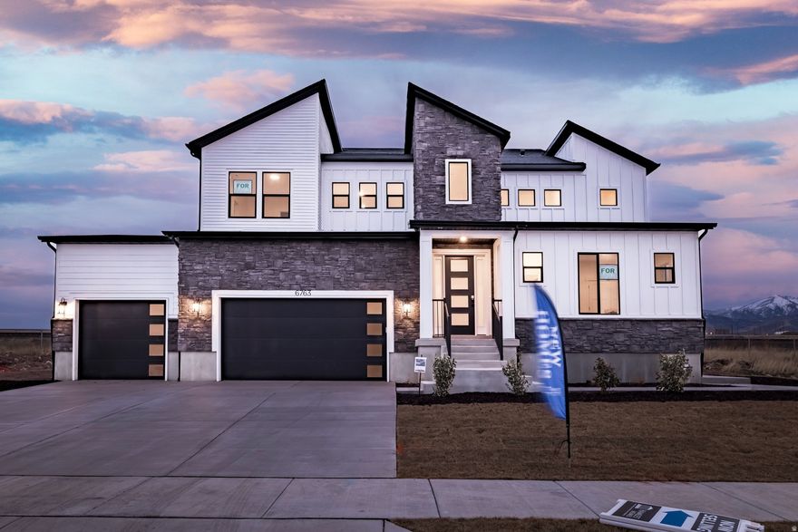 Stunning Elwood by Hamlet Homes with a full finished basement apartment-complete with kitchen, living room, 2 bedrooms, 2 baths, and laundry. Perfect for rental income or multigenerational living. Open and bright main level with modern kitchen, office, and bedroom with an ensuite bathroom. Special financing available: 5.25% PERMANENT RATE BUYDOWN with preferred lender. A rare opportunity for new construction + income potential + a below-market long-term rate.