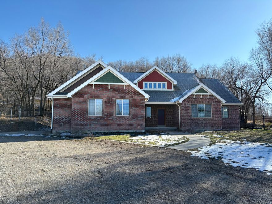 Endless potential on this rare 1.37-acre horse property! Featuring a beautiful, timeless brick exterior, this home is ready for your vision and finishing touches inside. The interior is currently unfinished, offering a blank canvas to design and customize every detail to your exact style and needs. The expansive lot provides plenty of room for animals and future improvements. A large barn-style shed adds incredible value, perfect for housing horses, equipment, or creating the ultimate workshop or hobby space.  This is a Fannie Mae HomePath property.  First-time buyers, complete the HomePath Ready Buyer homeownership course on Homepath.com. Attach certificate to offer up to 3% closing cost assistance. Check HomePath.com for more details. Restrictions apply.