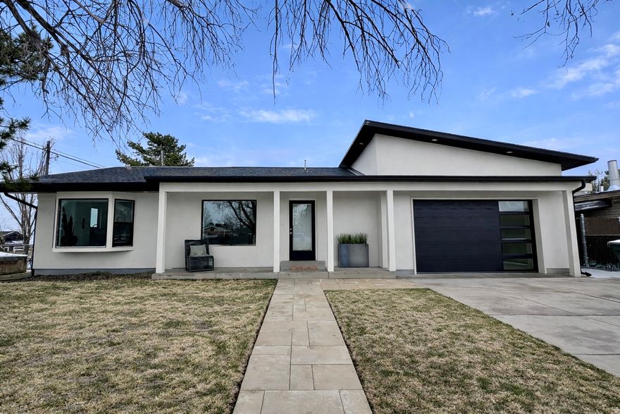 This recently renovated home offers a fresh, modern feel with everything completely new, from the interior updates to the outdoor space. The open floor plan features large windows that flood the home with natural light, creating a bright and inviting atmosphere. The home includes five bedrooms and two full bathrooms, both with double sinks, providing plenty of space and convenience. The kitchen and bathrooms are finished with sleek quartz countertops. The property also includes a brand-new yard with a sprinkler system, a cozy firepit area, and a fully fenced yard for privacy and security. Inside, you'll find a tankless water heater, a new furnace, and central air conditioning, ensuring comfort and efficiency year-round. The basement is plumbed and ready for a kitchen, making it easy to turn into a mother-in-law suite or additional living space. Located in a great area, this home combines stylish design with convenience, making it a perfect place to call home.  Schedule your showing today! OPEN HOUSE SATURDAY FEB 21ST, 12-2.