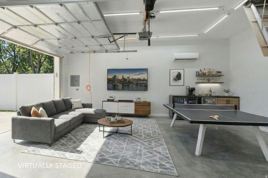 Perfect for a summer block party hangout, workshop, or an ideal space for classic car enthusiasts, this Saratoga Springs, Utah Lake property features an additional 25' x 25' detached garage, The garage is fully insulated and temperature-controlled with both heating and cooling. It's also great for toy storage or hobby use.  Beautifully remodeled from top to bottom, this home offers no HOA and no rental restrictions, an excellent opportunity for homeowners and investors alike.  The exterior showcases striking curb appeal with a brand-new roof, modern metal eave accents, black gutters, contemporary black windows, new metal siding, and a stylish new front door.  Inside, every detail has been thoughtfully upgraded. Luxury plank flooring and fresh designer paint create a clean, modern feel throughout. The chef-inspired kitchen serves as the centerpiece, featuring white shaker cabinetry, quartz countertops with a dramatic waterfall edge, a custom panel-front refrigerator and dishwasher, and a sleek single-basin stainless steel sink with a pull-down faucet. A reverse osmosis system with remineralization adds everyday convenience.  Smart home features include smart light switches, thermostat control, smart garage door openers, ceiling fans in every room, Ring security cameras, and energy-efficient recessed LED lighting. A new water heater and water softener enhance comfort and efficiency.  Two additional guest bedrooms provide comfortable accommodations one with a walk-in closet alongside a beautifully designed bathroom with shiplap accents, modern fixtures, and warm white oak cabinetry.  The home offers an abundance of storage with finished attic space above the detached secondary garage.   In addition, the home includes an oversized attached two-car garage and a dedicated parking pad for RV or boat storage, providing ample space for all your vehicles and recreational needs.  Located near Utah Lake in one of Saratoga Springs' most desirable areas, this home offers the perfect balance of luxury finishes, smart technology, and lifestyle flexibility.