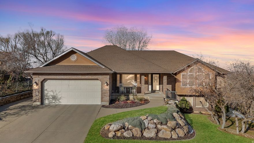 If you are looking for a home close to the mountains, surrounded by hiking trails and still conveniently  close to town- your search is over!  Discover a rare opportunity to own a stunning home on the sought-after east bench of Layton. This spacious residence features five bedrooms and three bathrooms, perfect for anyone seeking room to grow.  Enjoy a flexible layout with a walk-out basement, wet bar downstairs and ample storage throughout, including a convenient shed in the backyard.  Experience breathtaking panoramic views of the valley and unforgettable sunsets right from your home.  Located just 30 minutes from downtown Salt Lake City for dining and shopping, and a short drive to Snowbasin for winter sports, this location is perfect for outdoor enthusiasts.  For your peace of mind, this property has been pre- inspected (January  20, 2026) and comes with a one-year home warranty.  Don't miss this opportunity!  Schedule your private showing today.  All information provided herein is deemed reliable, but not guaranteed.  Buyers and their agents are encouraged to verify all information to their satisfaction before making any decisions. Square footage was obtained from a previous appraisal, dated 06/18/2019.