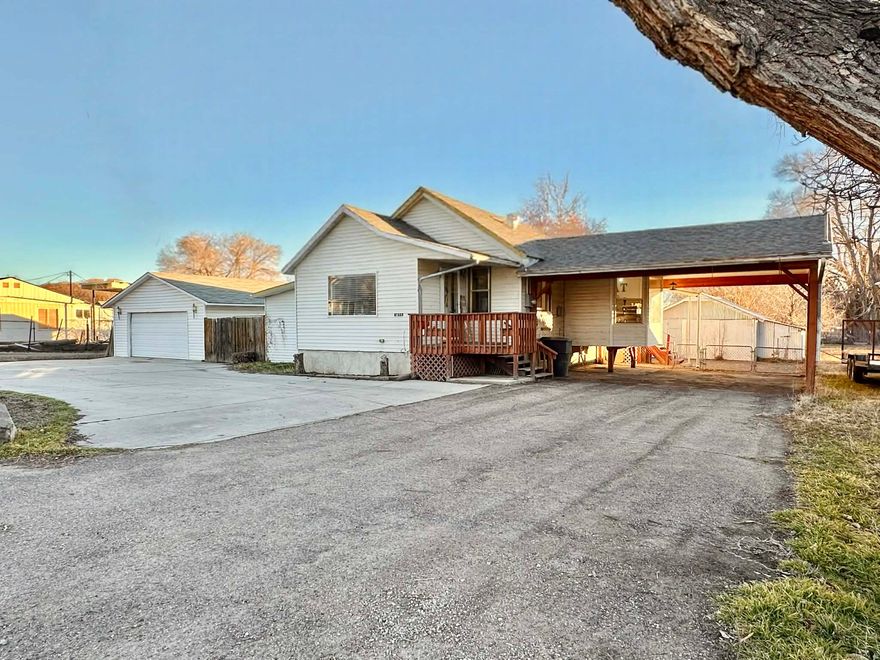 Welcome to 1855 W 2000 N in Helper, where space, privacy, and a quiet country setting come together. This 3-bedroom, 2.5-bath home sits on .54 acres, offering a true rural feel while still being within convenient distance to town.  Inside, the home features a comfortable and functional layout with plenty of natural light throughout. The kitchen provides ample counter space and storage, making it practical for everyday living. Two of the bedrooms offer cozy, well-sized spaces, including a comfortable primary bedroom with its own bathroom.  Outside, the acreage provides room to enjoy the outdoors, hobbies, or future possibilities. A 2-car garage adds everyday convenience, while the large storage shed offers excellent space for tools, equipment, or recreational gear.  Quiet, private, and full of potential, this property is ideal for anyone looking to enjoy the freedom and simplicity of country living.   Square footage figures are provided as a courtesy estimate only.  Buyer is advised to obtain an independent measurement.