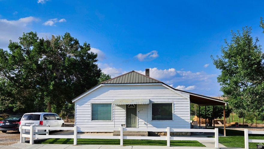 This is a wonderful 2-bedroom, 1-bathroom home. This is the perfect beginner home, full of charm and possibilities. The interior was remodeled in 2008 and the bathroom was done in 2024. It has central air and an updated metal roof. There is plenty of space to enjoy- pasture for animals with a pressurized irrigation system, garden space, and a large area for a kids playground. There are fruit trees, large shade trees, and lawns with sprinkler systems. The neighborhood is quiet, peaceful, and family-friendly. It is a 20 min drive from Joes Valley. It is near lakes, mountains, four-wheeler trails, hiking trails, bouldering in Cottonwood Canyon, and beautiful deserts.
