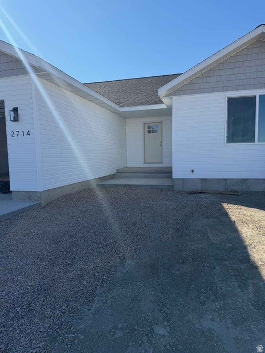 Located on desirable Cobble Drive, this beautiful new construction home features 4 bedrooms and 2 bathrooms with a spacious, open layout. The kitchen offers stylish epoxy granite countertops and great functionality. Situated on a large lot just minutes from Roosevelt, providing the perfect blend of quiet living and close-to-town convenience.  Square footage figures are provided as a courtesy estimate only and were obtained from building plan.  Buyer is advised to obtain an independent measurement.