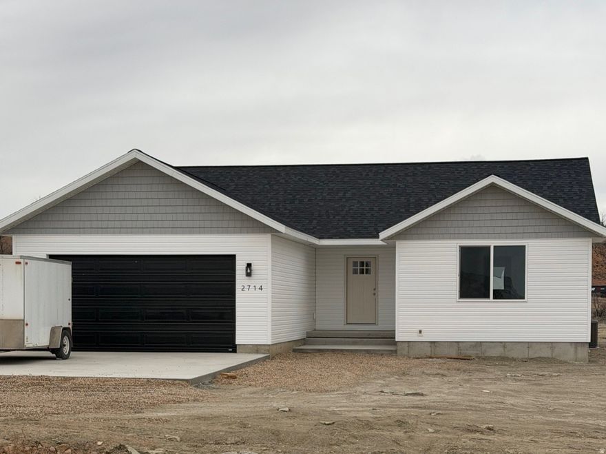 Located on desirable Cobble Drive, this beautiful new construction home features 4 bedrooms and 2 bathrooms with a spacious, open layout. The kitchen offers stylish epoxy granite countertops and great functionality. Situated on a large lot just minutes from Roosevelt, providing the perfect blend of quiet living and close-to-town convenience.  Square footage figures are provided as a courtesy estimate only and were obtained from building plan.  Buyer is advised to obtain an independent measurement.