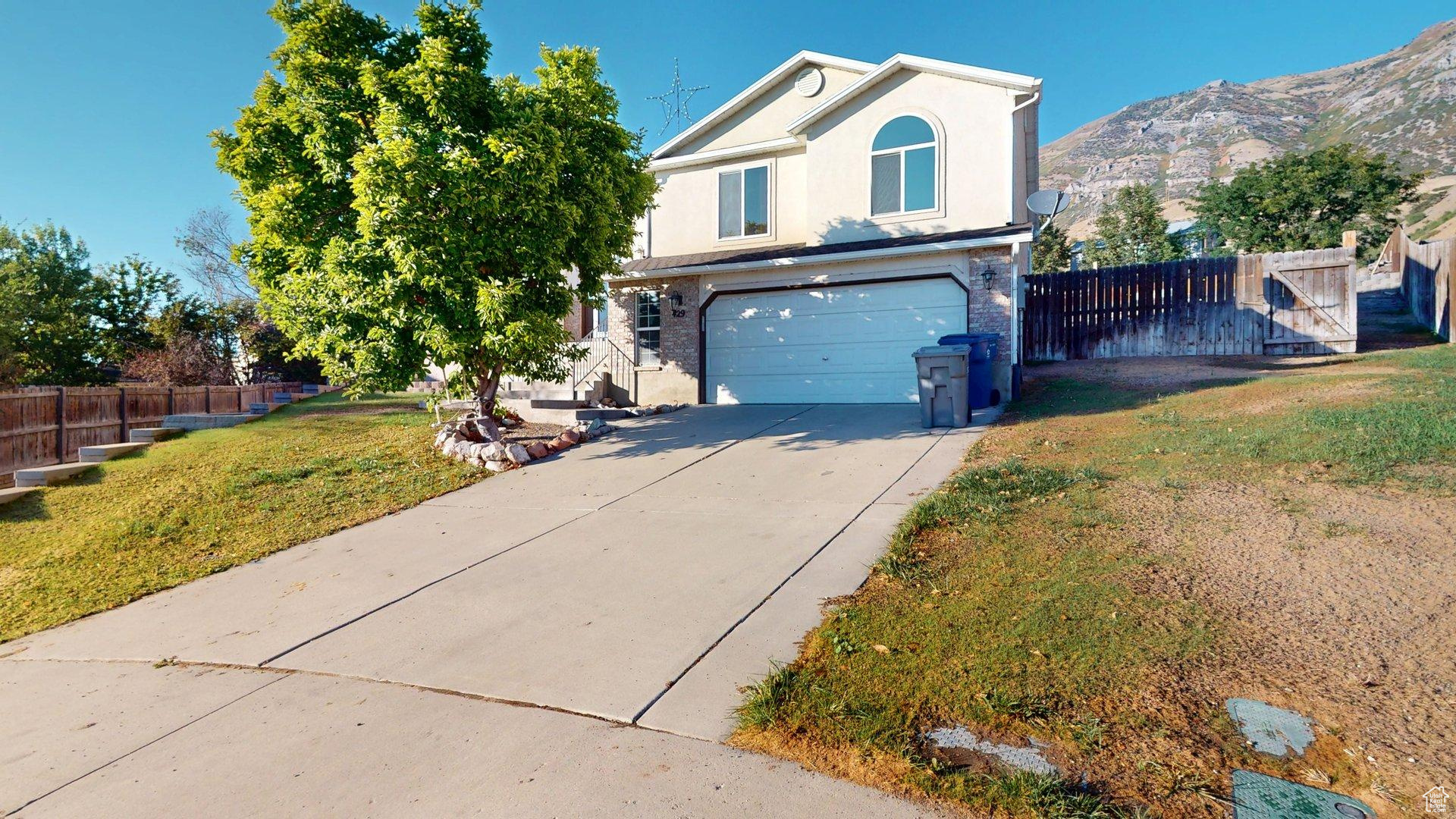 You won't want to miss this unique home with lots of upgrades. Retaining wall just finished, sprinklers repaired with new clock, and new grass coming in! Remodeled kitchen, primary walk-in shower, and finished basement. Multiple RV parking pads for all the toys. New roof, new appliances, furnace & AC only a few years old. Vaulted ceiling & custom counter tops & backsplash you won't see anywhere else. Enjoy customized led lighting inside and out. Laundry room is ready for both electric and gas. Added canned lighting in vaulted front room. Built-in entertainment center in basement with USB outlets throughout. Check out the huge crawlspace for storage. Two bathrooms have a bidet and basement bath has lighted/heated mirror to keep the steam off with heat lamp in shower for a sauna effect. This unique home is tucked in a quiet cul-de-sac in a fantastic neighborhood with amazing views. SqFt per appraisal. Buyer to verify. Make this your dream home & submit an offer today.