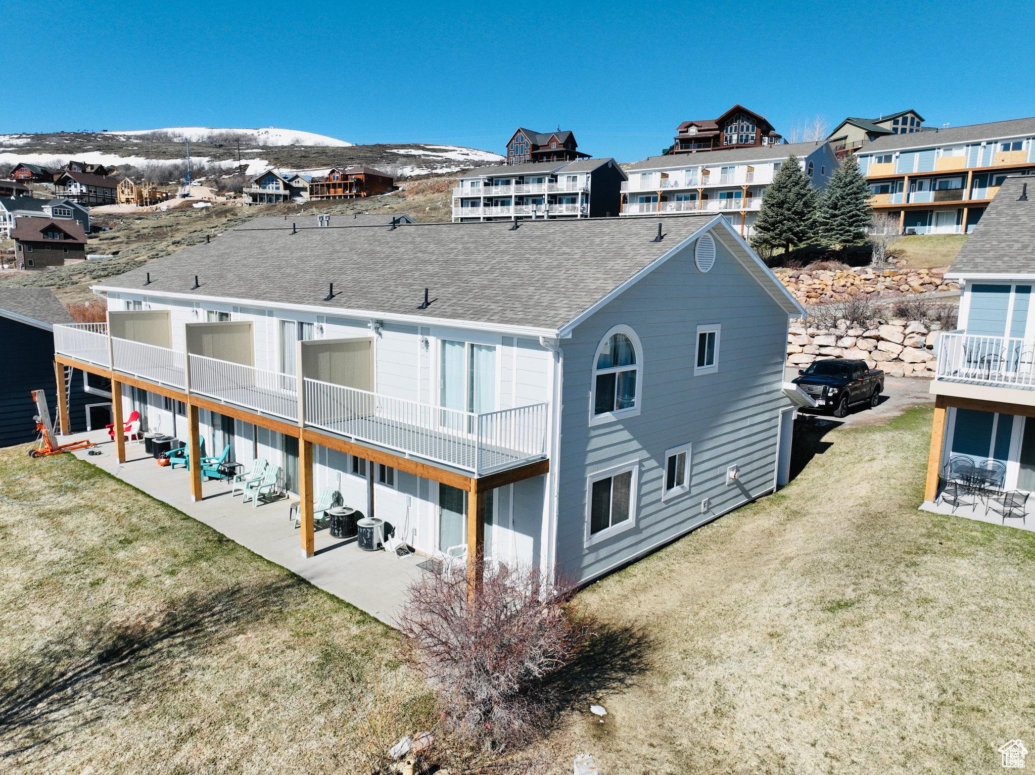 Now offering an exclusive end unit Newberg condo at Harbor Village with the best views in all of Bear Lake. Brand new exterior deck. Overlooking the current state marina with a new marina being built! This property is approved for nightly rentals and currently being used as one. Amenities include paved roads, snow removal, tennis courts, and access to an in-ground pool.