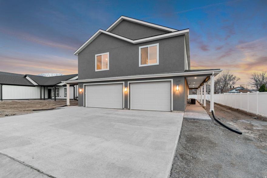 Stunning home with an ADU for guests, income, or multigenerational living. Enjoy breathtaking Mt. Nebo & valley views, two granite kitchens, a gas fireplace, luxury primary suite with soaking tub & double shower, covered balcony and patio with BBQ gas hookup, RV pad, and spacious backyard with room for future sports court-all minutes from Payson Lakes.  Square footage figures are provided as a courtesy estimate only.  Buyer is advised to obtain an independent measurement. Upstairs address is 337, and downstairs is 339.