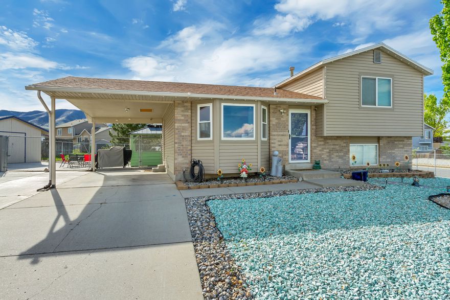 Great Home with HUGE LOT!  Zero scaped for low maintenance and low water costs.  Enjoy the outdoor GAZEBO, HOT TUB and fire pit!  LARGE PATIO and SHED for extra storage.  Fruit trees and vegetable boxes!  Plenty of room for parking and to expand for RV parking if needed or add a garage.  ROOF REPLACED IN 2021!  HVAC SYSTEM replaced in 2018 along with downstairs plumbing!  Main level WINDOWS, sliding glass door and storm door replaced in 2021.  All appliances including washer and dryer are included!  Don't miss this well taken care of home!