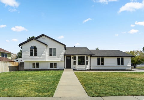 Photo of 5571 S DALE AMOUR DR W, Kearns, UT 84118 (MLS # 2181490)