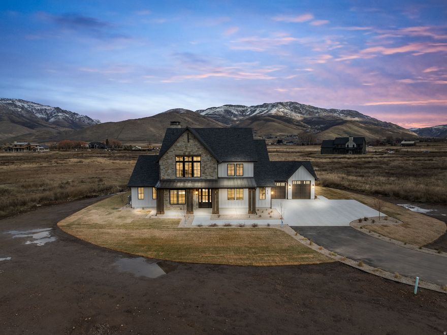 Experience the 3,500 sq. ft. estate home at SAGE, where luxury meets functionality on 5 acres of pristine land in Huntsville, Utah. Designed for both comfort and grandeur, this home features 3 spacious bedrooms, 3.5 bathrooms, a bunk room perfect for guests or family gatherings, and two separate two-car garages, offering ample space for vehicles, gear, and storage. With its thoughtfully crafted layout and high-end finishes, this home is the ideal retreat just minutes from Pineview Reservoir, Powder Mountain, and Snowbasin Resort-where mountain adventure and refined living go hand in hand.